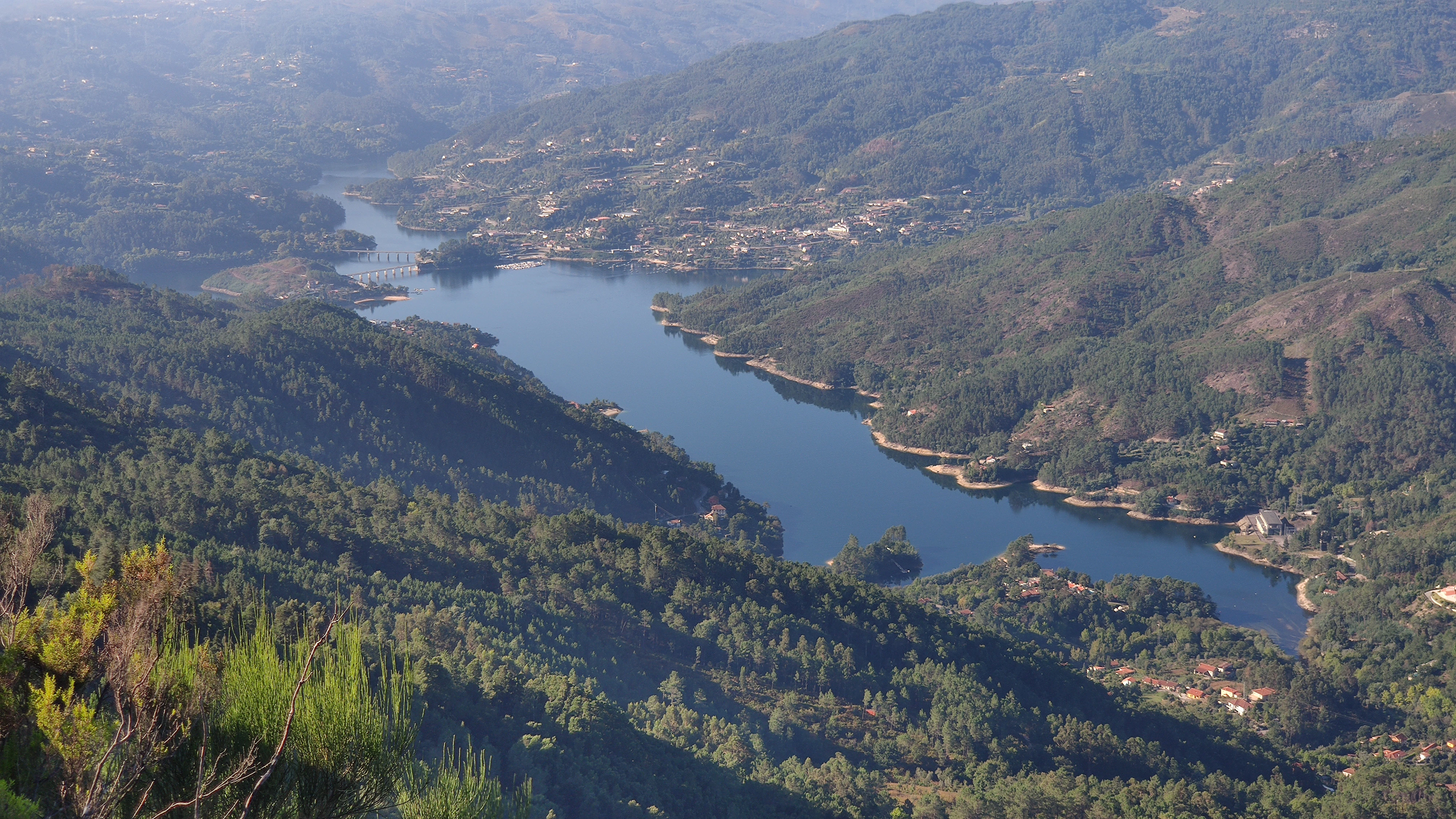 green mountains near lake during daytime