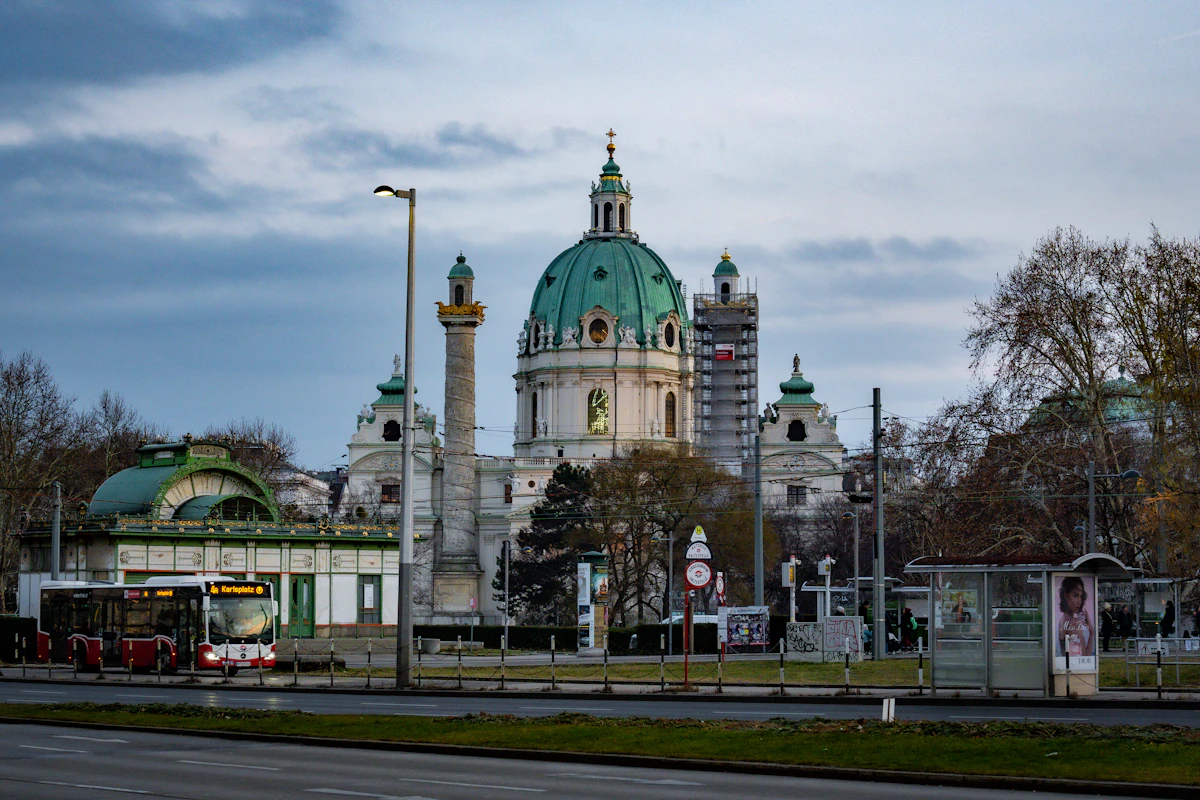 A large building with a green dome on top of it
