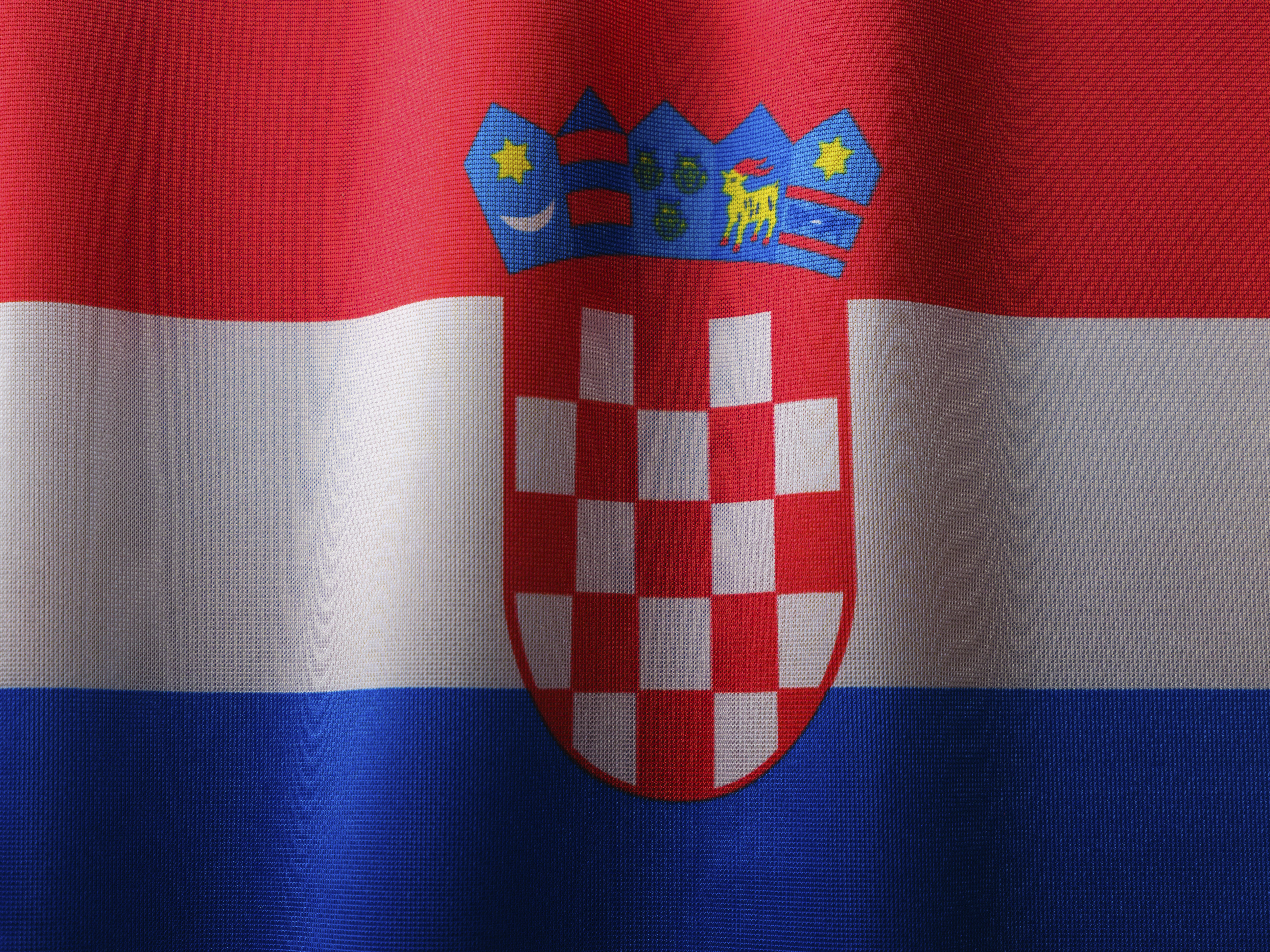 the flag of croatia is waving in the wind