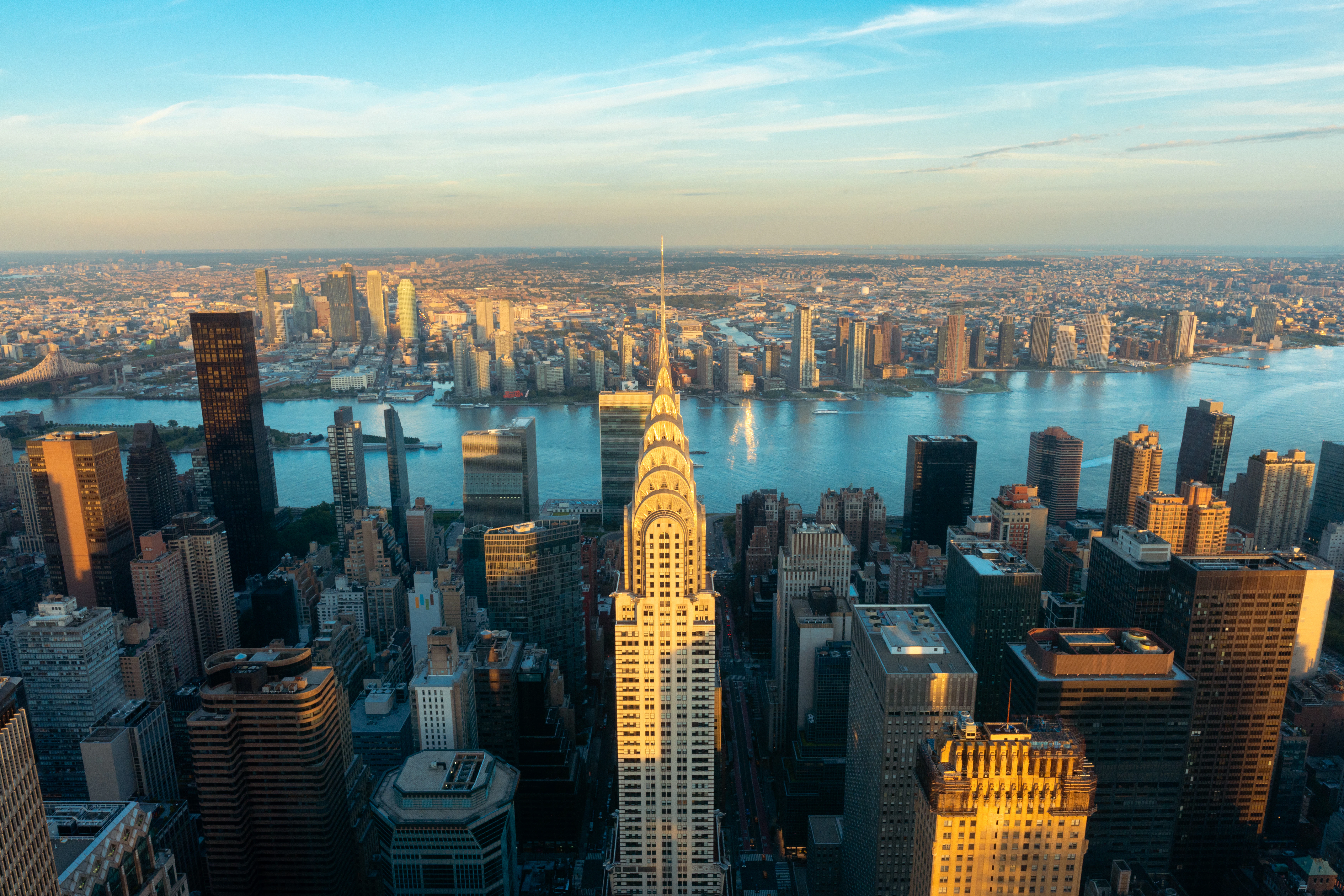 Chrysler building with new york city skyline at sunset