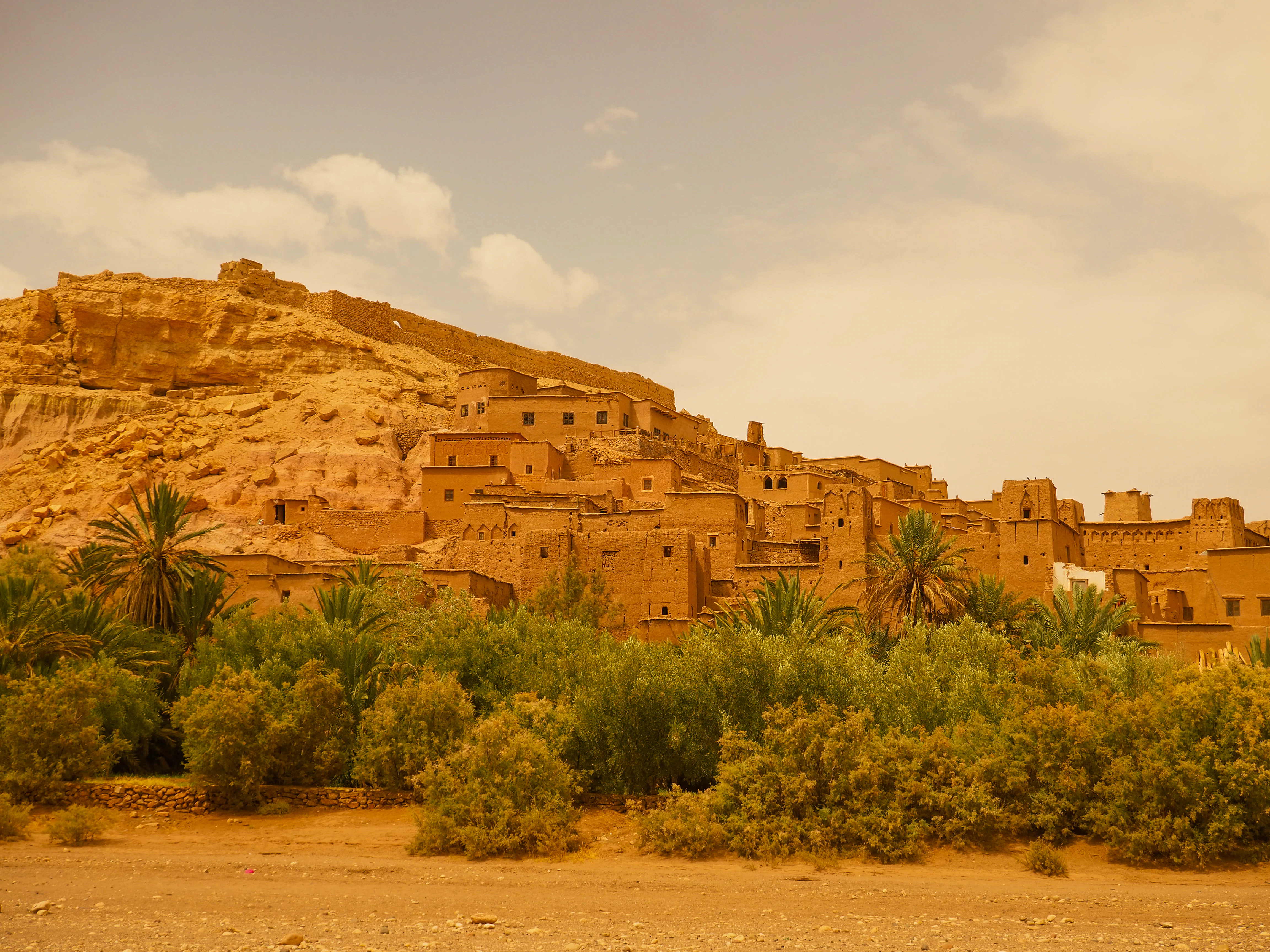 Ancient village built into a desert hillside.