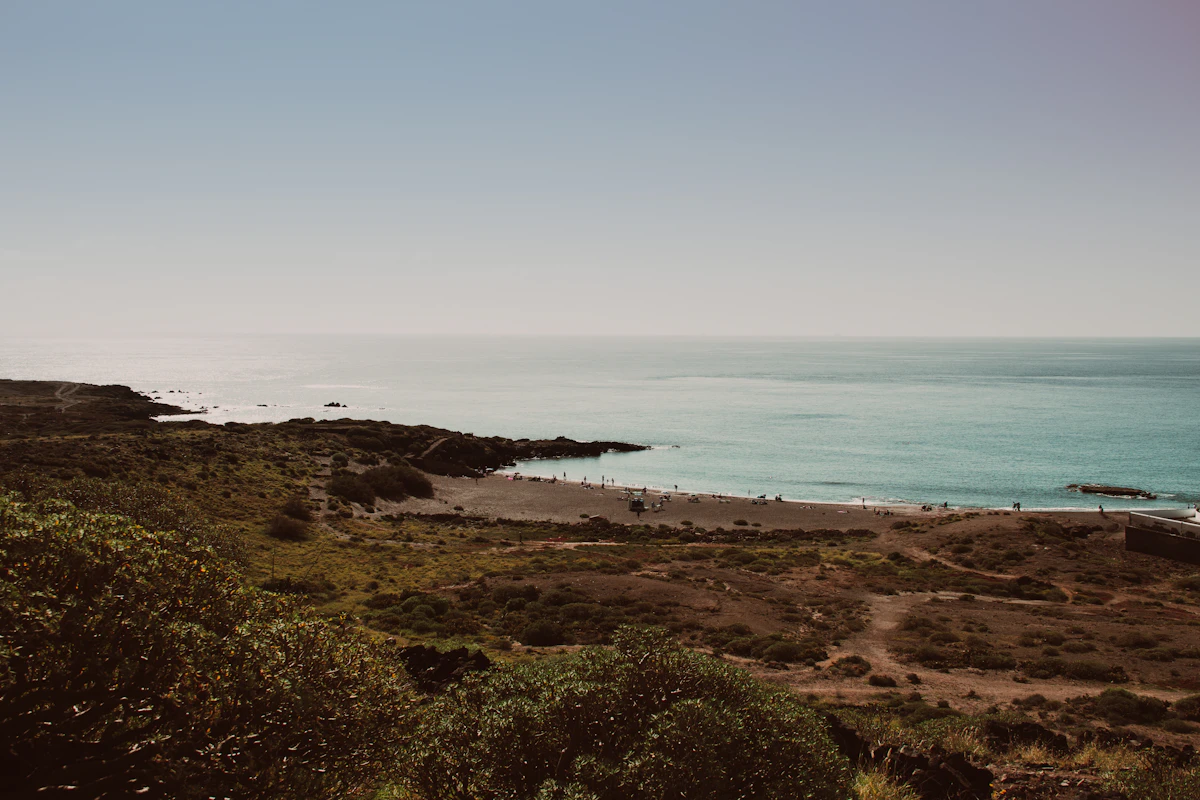 A view of a body of water from a hill
