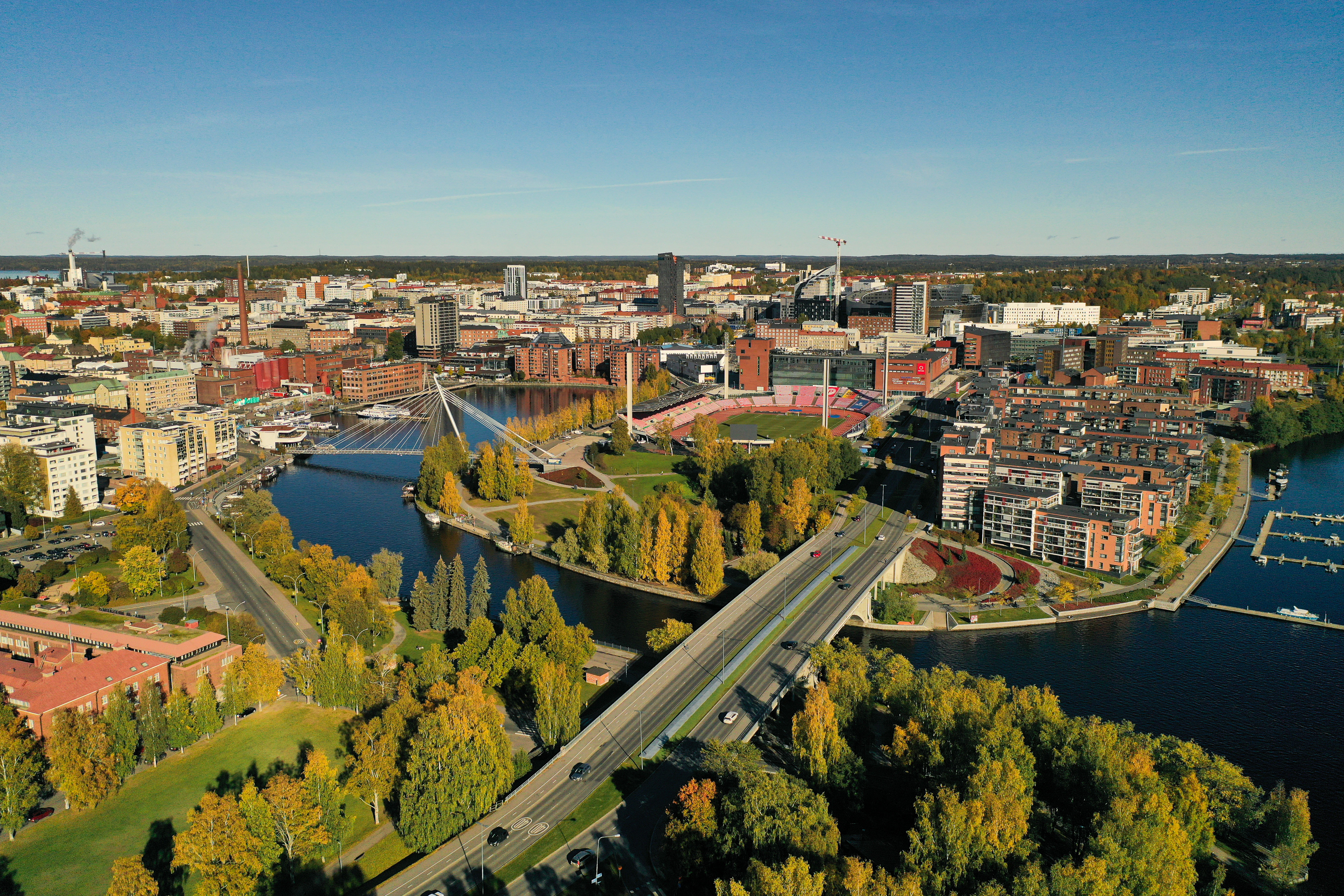 an aerial view of a city with a river running through it