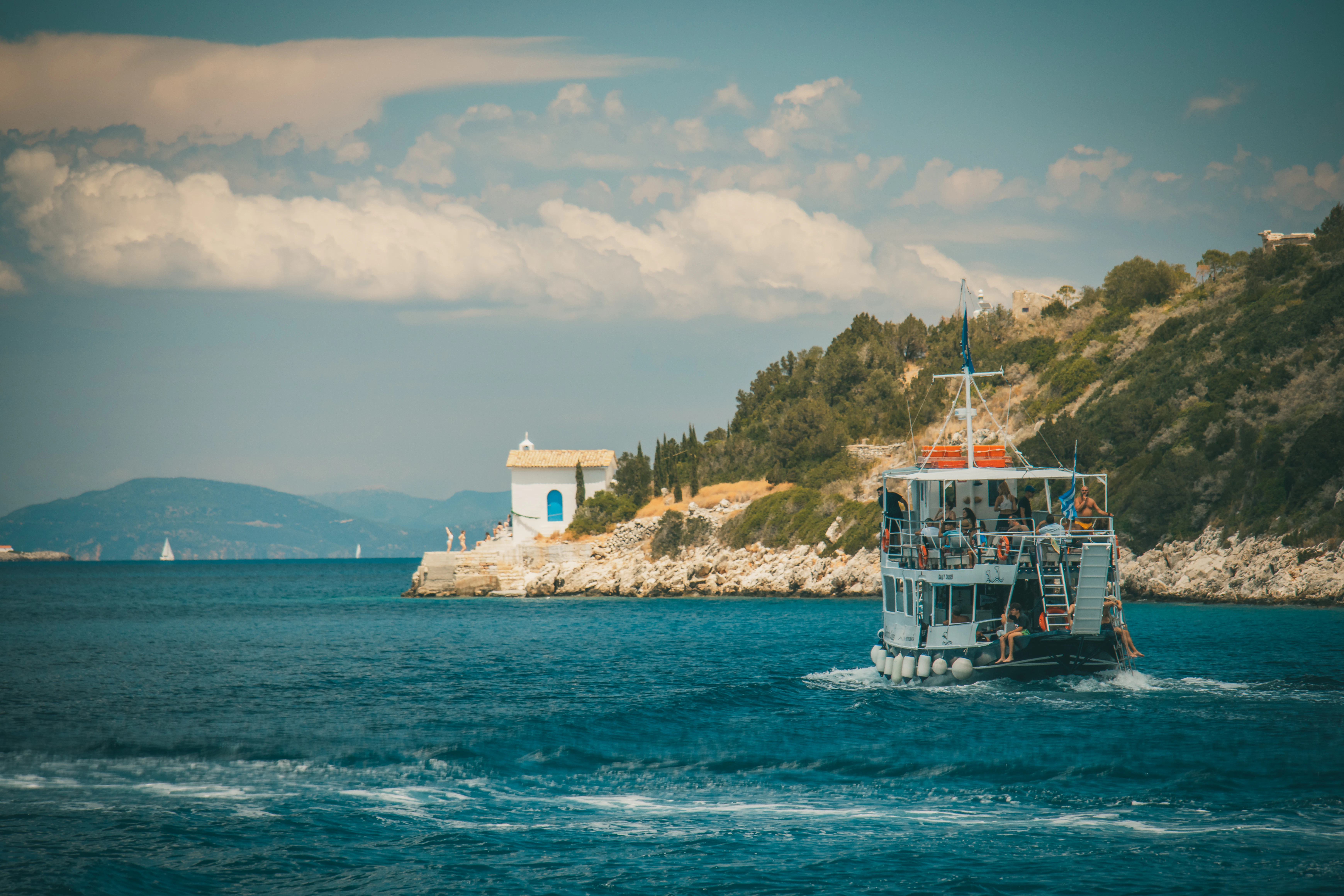a large boat traveling across a large body of water