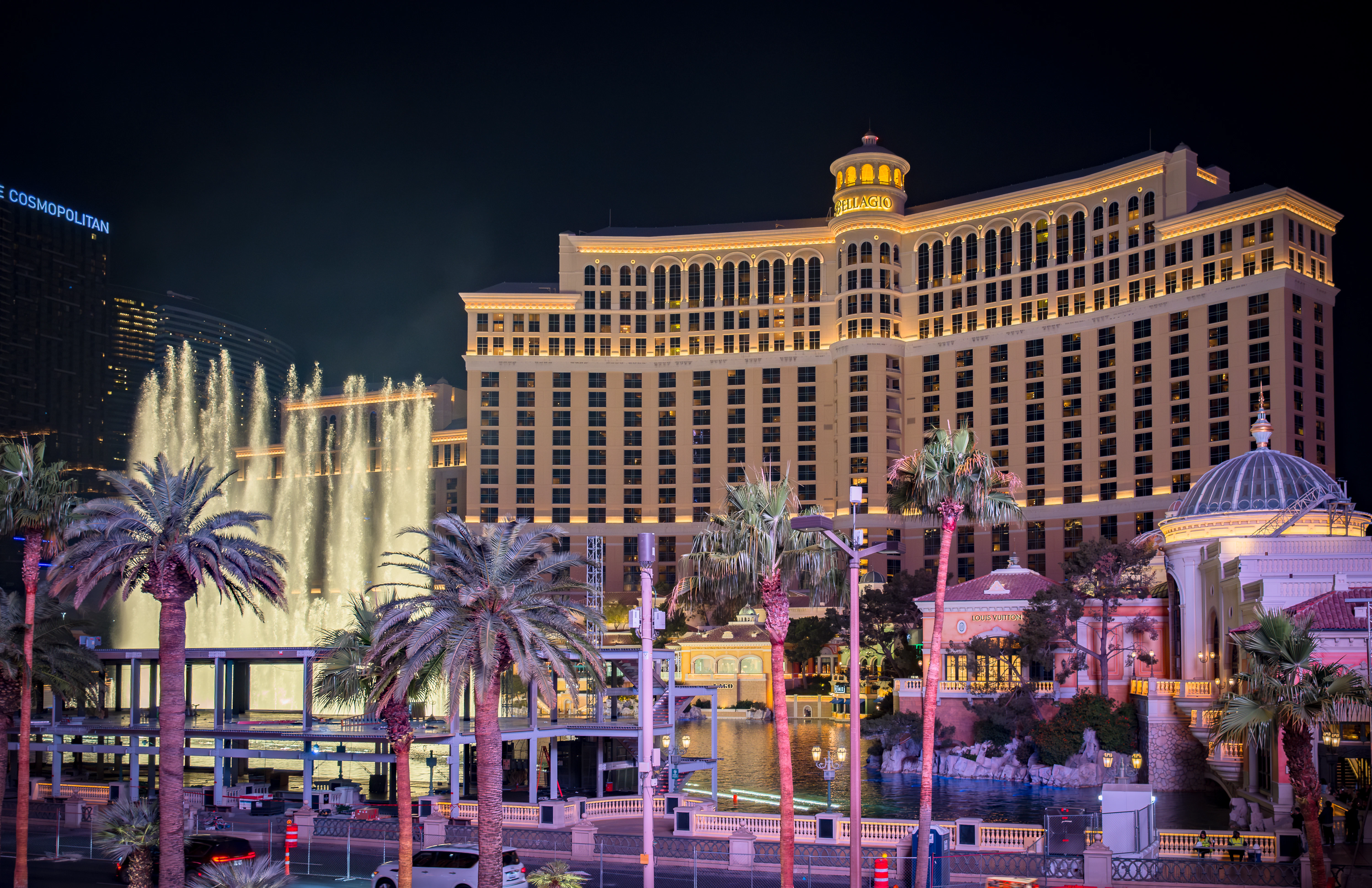 The las vegas hotel and casino is lit up at night