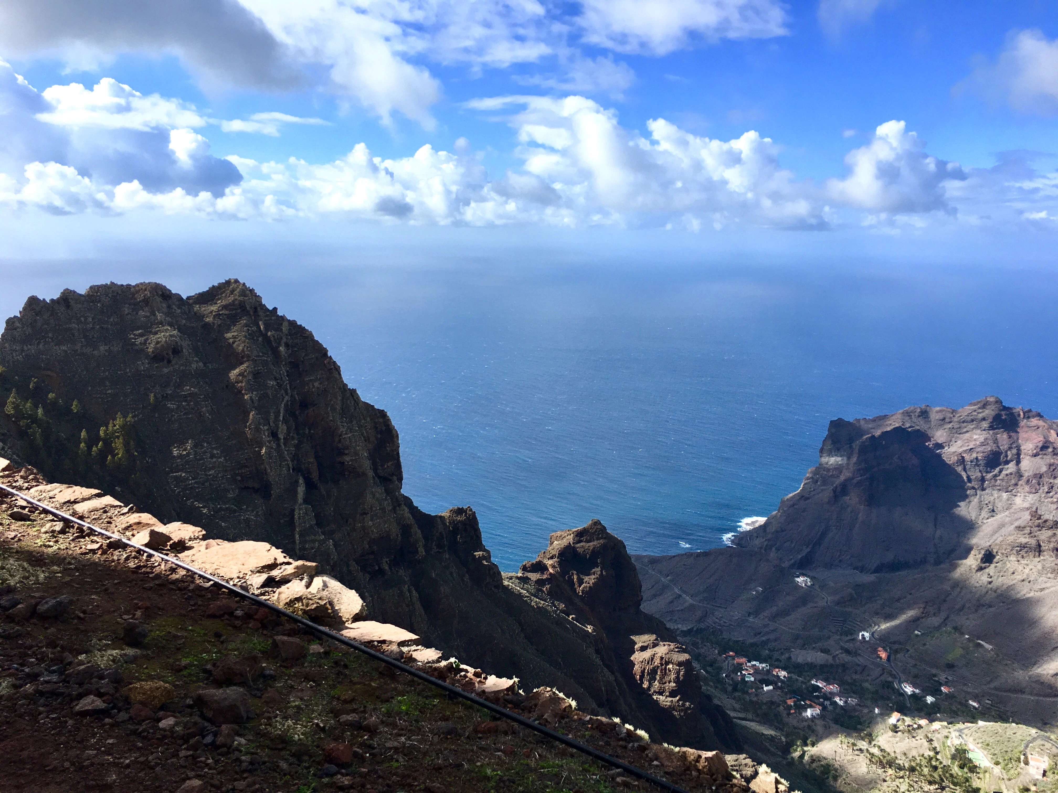 a view of the ocean from the top of a mountain