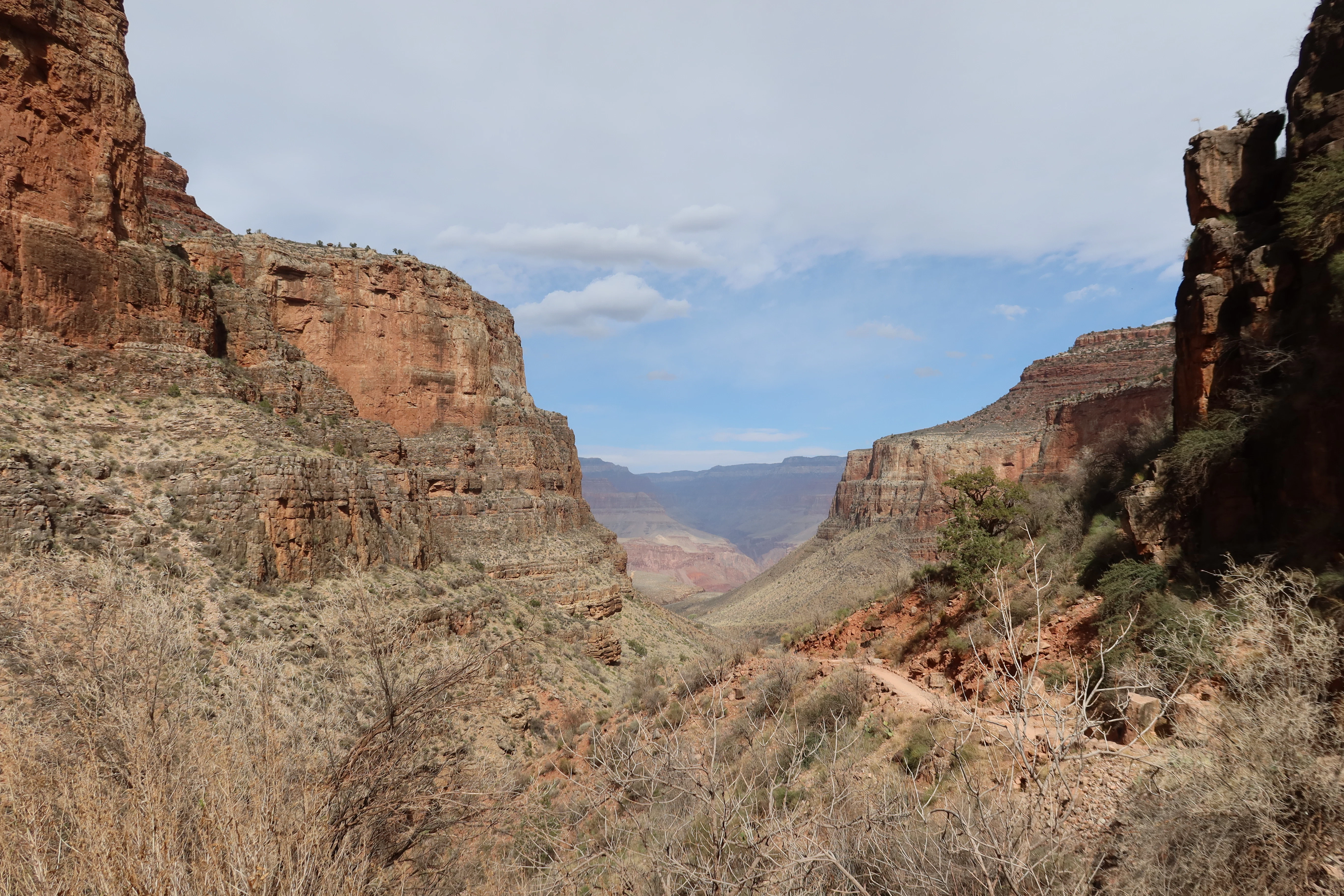 The grand canyon's vast and dramatic landscape unfolds.