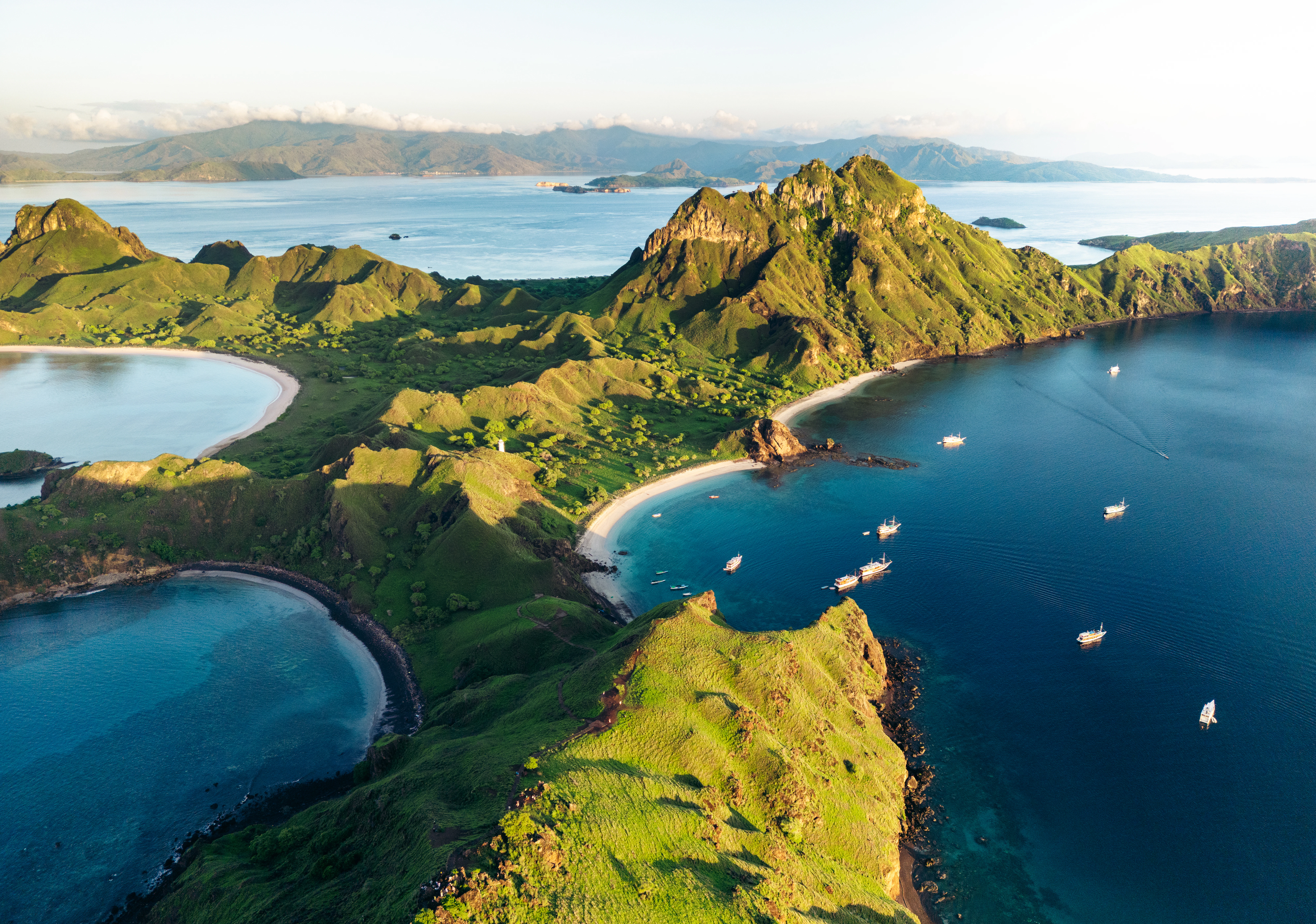 A large body of water surrounded by mountains