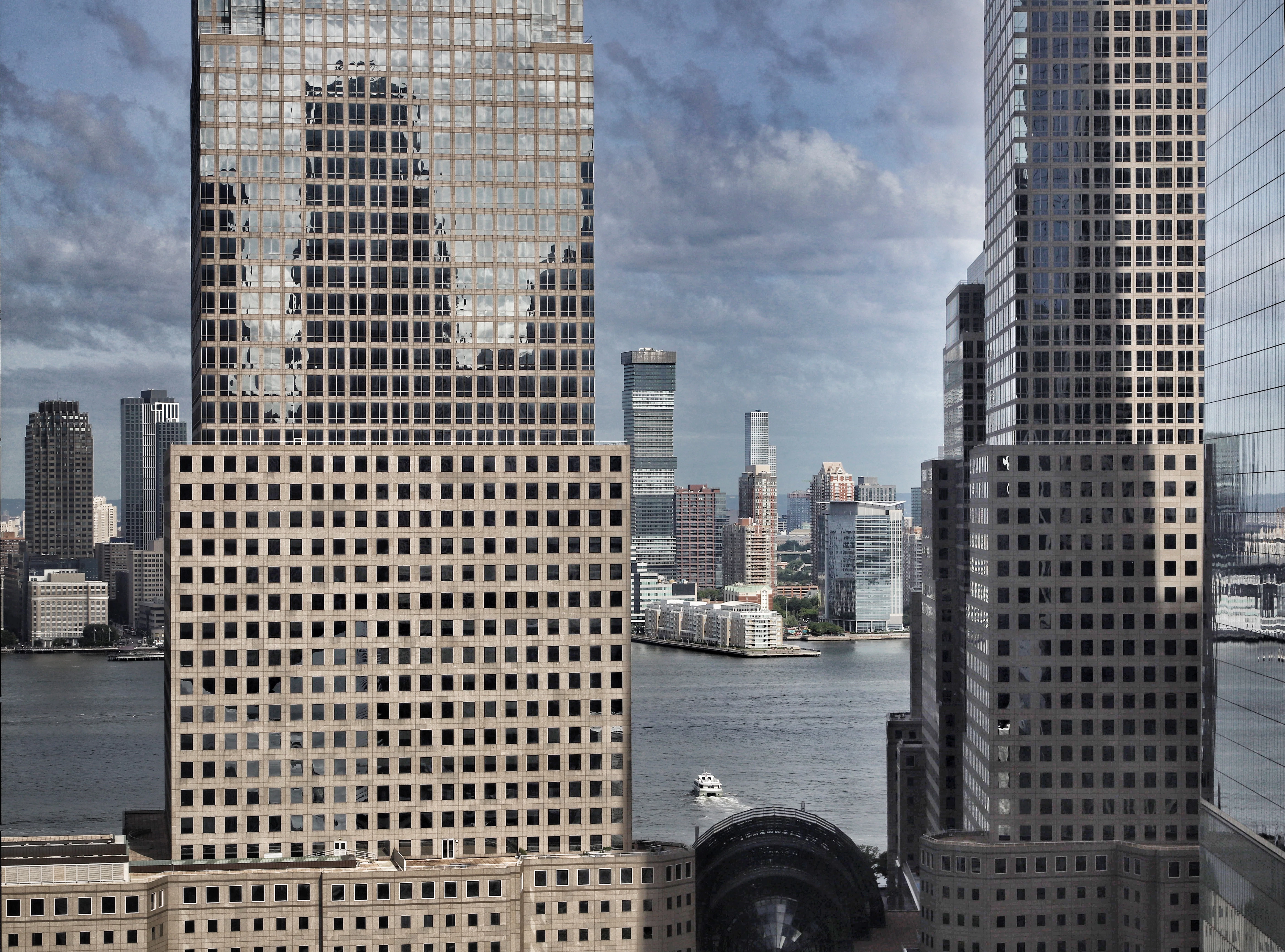 a city skyline with tall buildings
