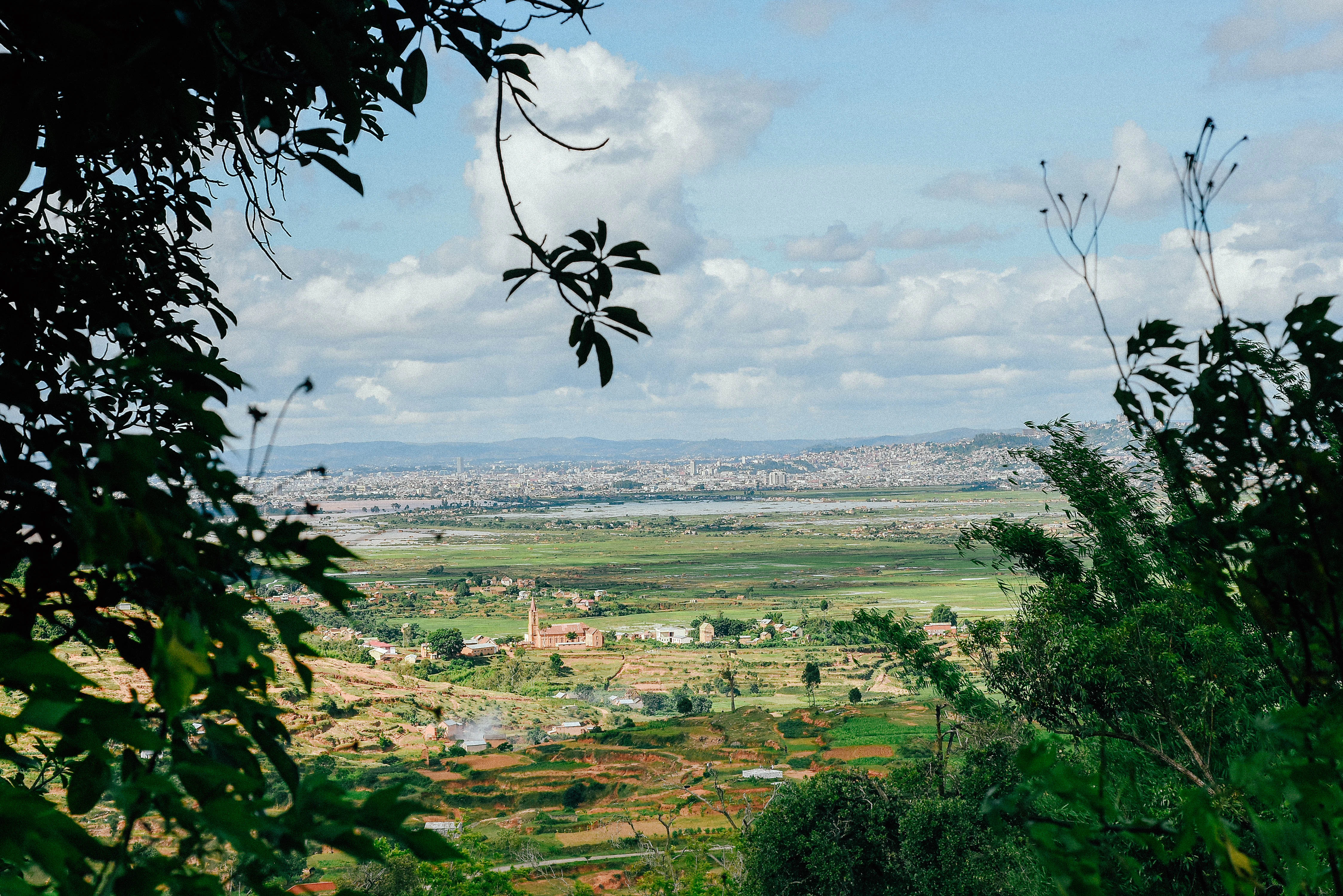 a view of a city from a hill