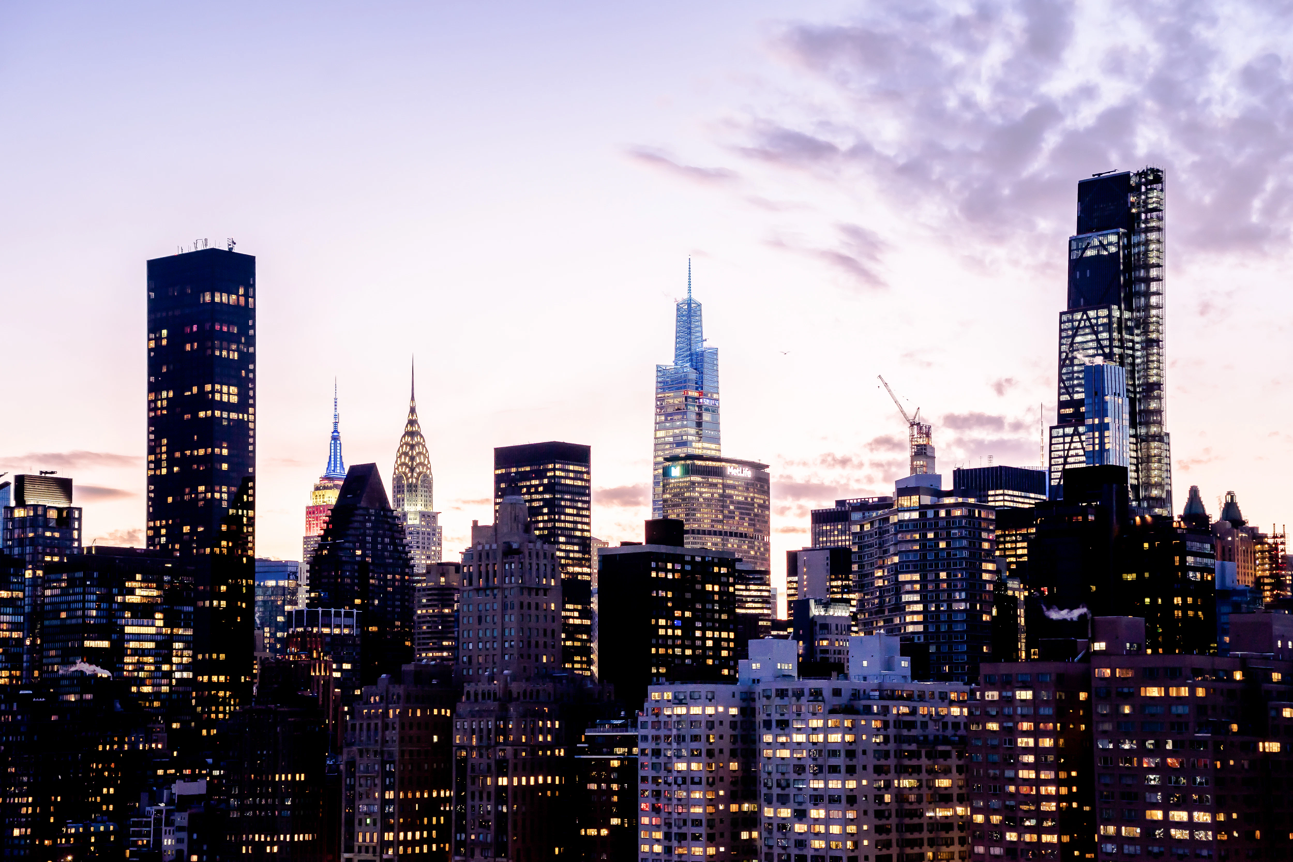 New york city skyline at dusk with lit buildings