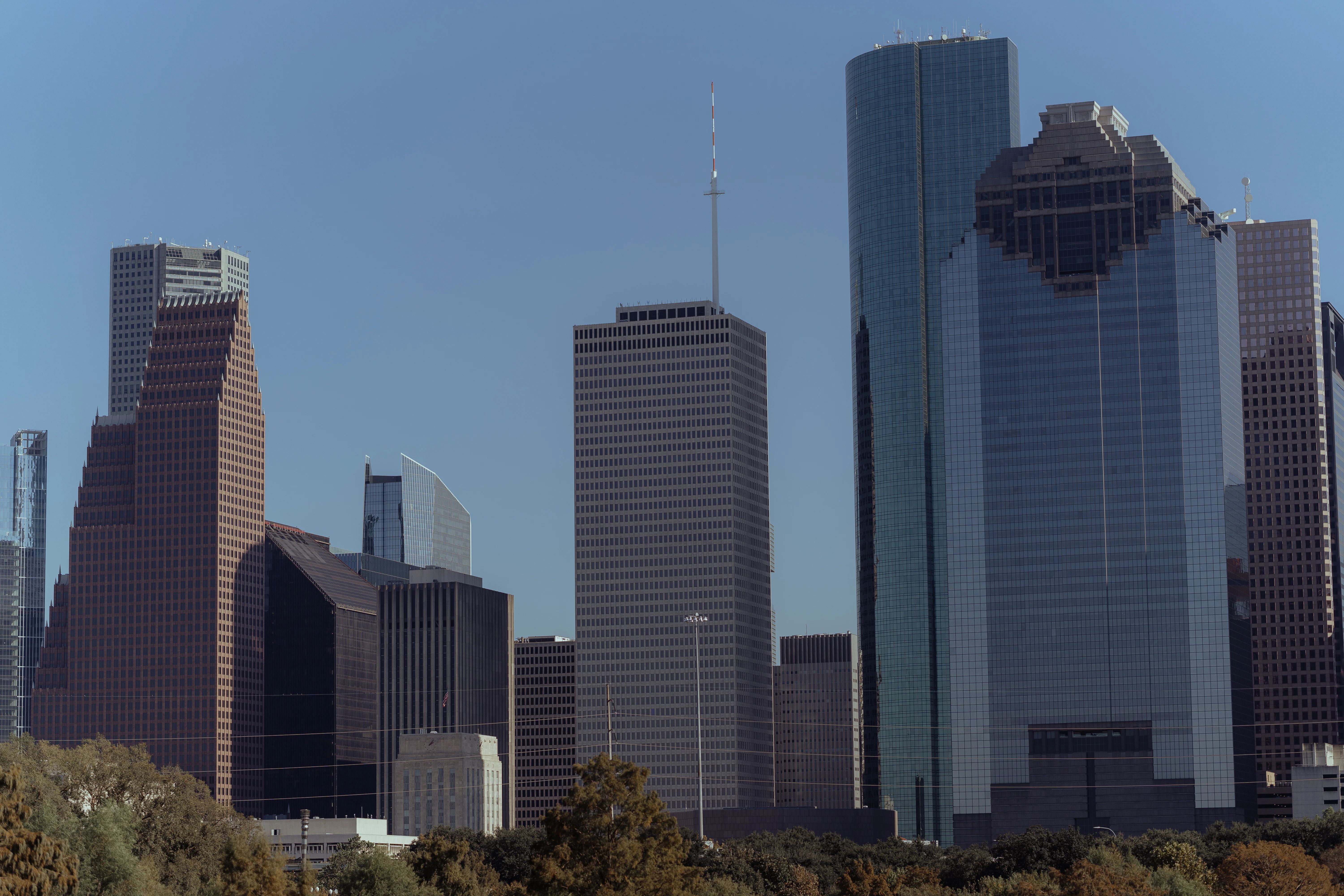 a group of tall buildings in a city